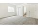 This bedroom has plush carpet, ample natural light, and ensuite bath access at 5726 N Jebel Way, Aurora, CO 80019