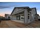 Backyard view of the home featuring a covered patio at 11452 Autumn Moon St, Littleton, CO 80125
