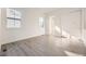 Neutral bedroom with wood floors, closet, and lots of light at 11452 Autumn Moon St, Littleton, CO 80125