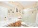 Bathroom featuring a glass door shower and wooden vanity at 23453 Painted Hills St, Parker, CO 80138