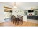 View of the dining area and sliding doors leading to the backyard at 23453 Painted Hills St, Parker, CO 80138