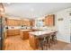 Expansive kitchen with stainless steel appliances, granite countertops, and a breakfast bar at 23453 Painted Hills St, Parker, CO 80138
