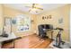 Office space with hardwood floors, large windows, and a comfortable work area at 23453 Painted Hills St, Parker, CO 80138