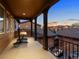 Relaxing balcony with comfortable seating and neighborhood views at 9487 Winding Hill Way, Lone Tree, CO 80124
