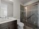 Modern bathroom with glass shower, updated fixtures, and tile accents at 9487 Winding Hill Way, Lone Tree, CO 80124