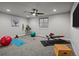 Home gym featuring a ceiling fan, recessed lighting, yoga mat, weights, and exercise equipment at 9487 Winding Hill Way, Lone Tree, CO 80124