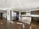 Spacious kitchen with stainless steel appliances, a large island, and modern finishes perfect for culinary enthusiasts at 9487 Winding Hill Way, Lone Tree, CO 80124