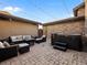 Backyard patio featuring comfortable seating surrounding a fire pit and a hot tub at 9487 Winding Hill Way, Lone Tree, CO 80124