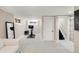 Finished basement with neutral carpet, a workout area, and access to stairs at 650 Saint Paul St, Denver, CO 80206