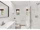 Modern bathroom with subway tile, a glass shower, and neutral tones at 650 Saint Paul St, Denver, CO 80206
