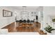 Elegant dining room with modern lighting and classic wainscoting, perfect for entertaining at 650 Saint Paul St, Denver, CO 80206