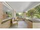 Covered front porch with comfortable seating, perfect for enjoying the outdoors at 650 Saint Paul St, Denver, CO 80206