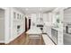Spacious kitchen with custom cabinets, granite counters, and stainless appliances at 650 Saint Paul St, Denver, CO 80206