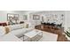 Spacious living room offering open layout views into the dining area and updated kitchen at 650 Saint Paul St, Denver, CO 80206