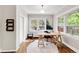 Well-lit office space with hardwood floors, multiple windows, and a neutral color palette at 650 Saint Paul St, Denver, CO 80206
