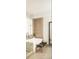 Bathroom with glass shower, soaking tub, bench seat, and decorative tile at 4200 W 17Th Ave # 53, Denver, CO 80204