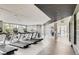 Modern gym featuring treadmills, equipment, and windows with plenty of natural light at 4200 W 17Th Ave # 53, Denver, CO 80204