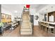 Open floor plan with a staircase, showcasing the kitchen and dining areas at 4200 W 17Th Ave # 53, Denver, CO 80204