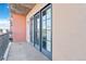 Private balcony with sliding glass doors, offering fresh air and natural light at 410 Acoma St # 309, Denver, CO 80204
