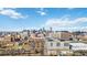 Scenic cityscape view overlooking city buildings, parking lots, and streets on a sunny day at 410 Acoma St # 309, Denver, CO 80204