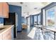 Resident lounge with dining area and bright natural light at 410 Acoma St # 309, Denver, CO 80204