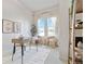 Bright home office with large windows, modern desk, and stylish decor at 410 Acoma St # 309, Denver, CO 80204