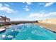 Stunning rooftop pool with mountain views and lounge area on a sunny day at 410 Acoma St # 309, Denver, CO 80204