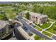 Aerial view of a community with multiple apartment buildings, water features and landscaping at 10787 Twenty Mile Rd # 205, Parker, CO 80134