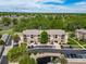 Scenic aerial view of condo building, showcasing its location within a lush, green neighborhood at 10787 Twenty Mile Rd # 205, Parker, CO 80134