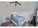 Bedroom with a bed, a side table, and hard wood flooring at 10787 Twenty Mile Rd # 205, Parker, CO 80134