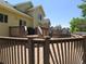 A multi-level wooden back deck offers an area for relaxation and grilling at 19421 E Evans Dr, Aurora, CO 80013