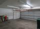 A spacious garage with storage cabinets and an automatic door opener at 19421 E Evans Dr, Aurora, CO 80013
