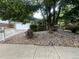 Lovely home with a well manicured front yard landscaping and large tree at 10883 Otis Cir, Westminster, CO 80020