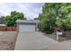Charming single-Gathering home with a two car garage, brick accents, and mature trees at 10883 Otis Cir, Westminster, CO 80020