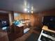 Spacious kitchen with breakfast bar, stainless steel appliances, and plenty of storage at 2602 Jasmine St, Denver, CO 80207