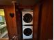 Conveniently located stacked washer and dryer offer space-saving laundry solution at 2602 Jasmine St, Denver, CO 80207