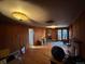 Inviting living room featuring hardwood floors, a fireplace, and natural light, perfect for cozy evenings at 2602 Jasmine St, Denver, CO 80207