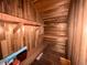Small wooden storage room featuring simple shelving and compact space optimization at 2602 Jasmine St, Denver, CO 80207