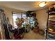 Storage room with shelving, window and packed with boxes and equipment at 2602 Jasmine St, Denver, CO 80207
