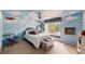 ' bedroom with a custom painted mural, ceiling fan, and window seat at 5432 S Dayton Ct, Greenwood Village, CO 80111