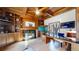 Executive office boasts custom wood finishes, built-in shelving, a fireplace, and a large desk area at 5432 S Dayton Ct, Greenwood Village, CO 80111