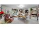 Office with desk, window seat, and ample shelving at 5432 S Dayton Ct, Greenwood Village, CO 80111
