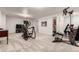 Finished basement featuring carpeted floors and workout equipment at 1633 S Trenton St, Denver, CO 80231
