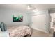 Bright bedroom features closet, ceiling fan and is tastefully decorated at 1633 S Trenton St, Denver, CO 80231