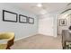 Cozy bedroom with large closet, plush carpet, and large window for natural light at 1633 S Trenton St, Denver, CO 80231
