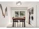 Dining Area next to washer and dryer, and sliding door to a patio at 1633 S Trenton St, Denver, CO 80231