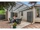 Cozy patio area with outdoor seating under a charming pergola at 1633 S Trenton St, Denver, CO 80231