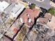 Overhead shot of property showcasing roof, chimneys, landscaping, and proximity to neighboring homes at 2323 S Jamaica St, Aurora, CO 80014