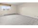 Large bedroom featuring neutral carpet, natural light and lots of space at 2323 S Jamaica St, Aurora, CO 80014