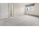 Bright and airy bedroom with ample space, plush carpeting and natural light at 2323 S Jamaica St, Aurora, CO 80014